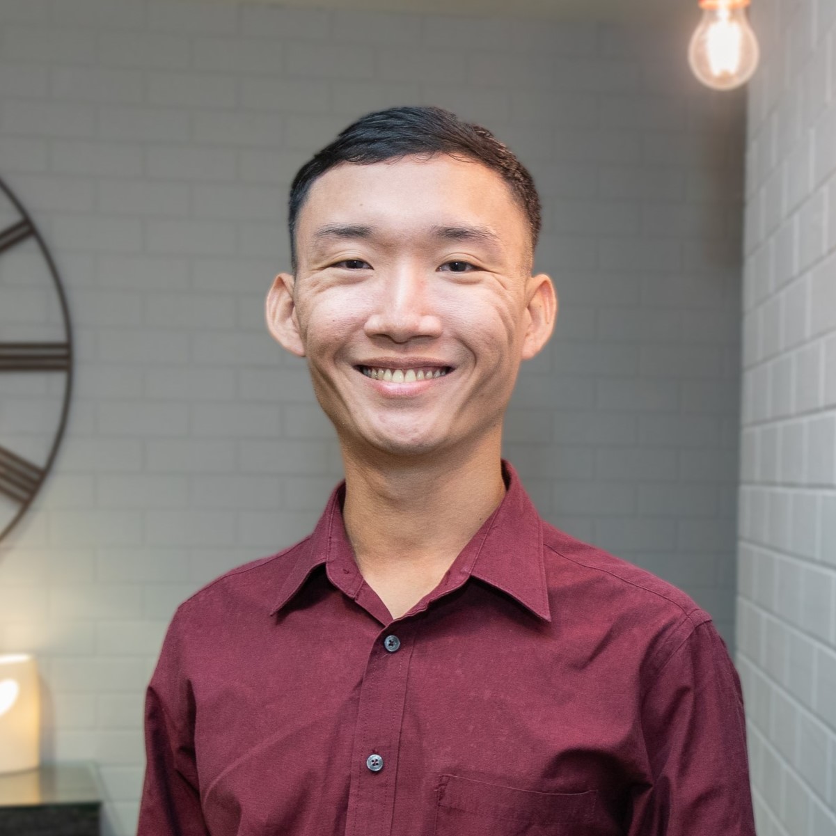 a picture of Chee Hwa Tang smiling